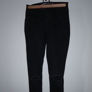 ZARA- Black jeans with rips in the knees